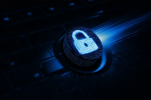 A laptop glowing with a bright login prompt in a minimalistic setup, symbolizing the protected access system at RK888.
